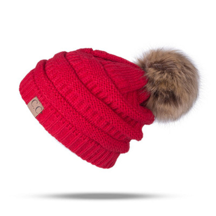 Women’s solid colors knitted beanie Hats fleece Lining caps with fur pompom