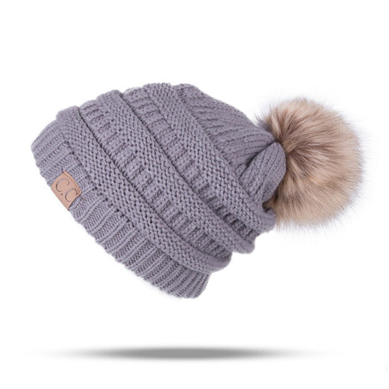 Women’s solid colors knitted beanie Hats fleece Lining caps with fur pompom